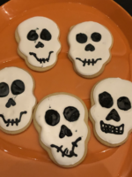Skull cookies on pumpkin tray
